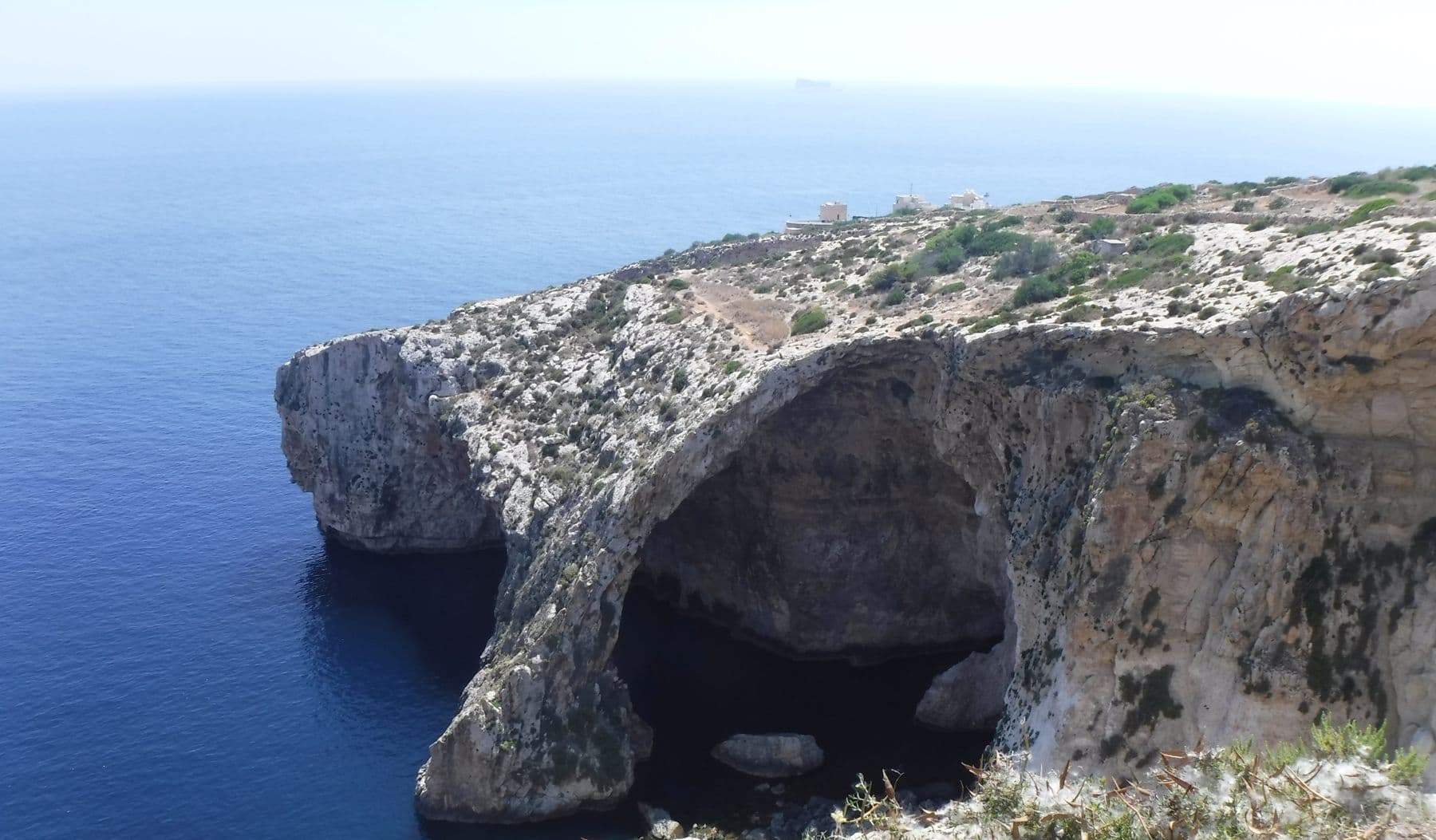 Sea arch and cliffs at the Blue Grotto in Malta